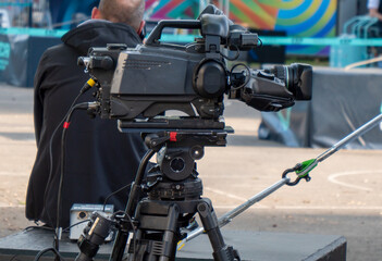 professional video camera on a tripod