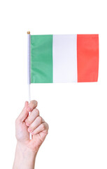 A hand holds the flag The flag of Italy on a white isolated background.