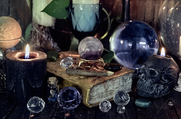 Wicca, esoteric and occult still life with vintage magic objects on witch table altar for mystic rituals and fortune telling. Halloween and gothic concept