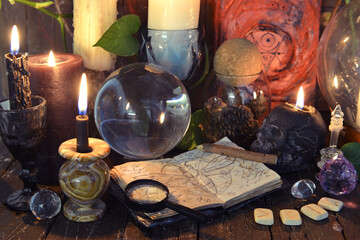 Wicca, esoteric and occult still life with vintage magic objects on witch table altar for mystic rituals and fortune telling. Halloween and gothic concept