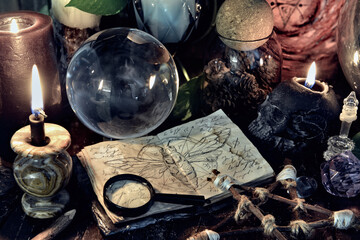 Wicca, esoteric and occult still life with vintage magic objects on witch table altar for mystic rituals and fortune telling. Halloween and gothic concept