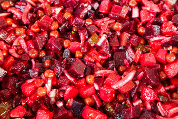 Vinaigrette salad. Salad with diced boiled beetroot vegetables, potatoes, carrots, pickled cucumbers and peas.