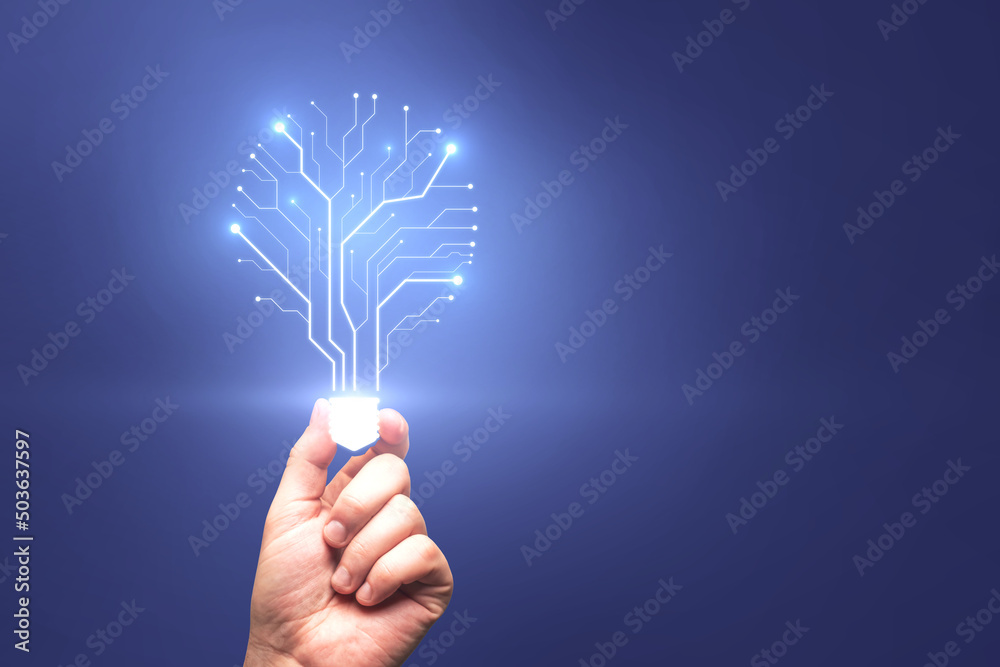 Poster close up of hand holding abstract glowing circuit light bulb on blue background. future, innovation 