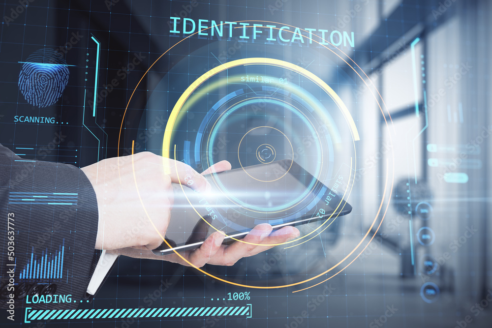 Poster Close up of businessman hand pointing at tablet with abstract round identification interface on blurry office interior background. Forensic hud and scanner concept. Double exposure.