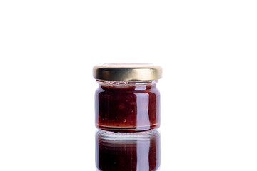 jar of jam on white isolated background with reflection