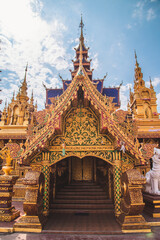 Fototapeta premium Wat Phiphat Mongkhon blue temple in Sukhothai, Thailand