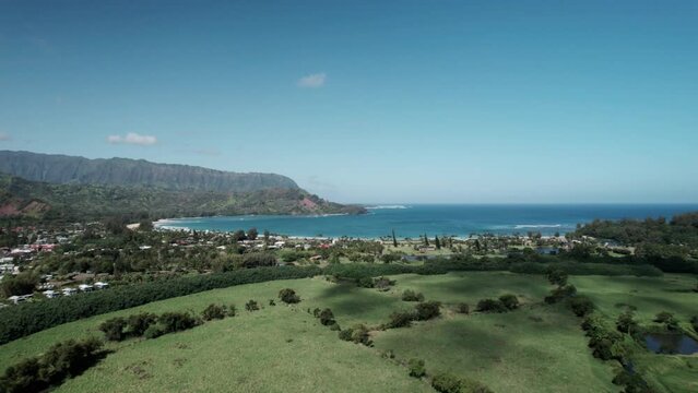 Mountains and tropical beaches, Hanalei Bay and Princeville, north shore Kauai, aerial panorama
