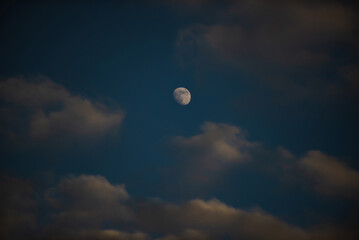 Moon in Ukrainian sky with clouds