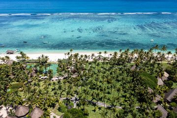 Aerial view Flic en Flac beach with luxury hotel and palm trees, Mauritius, Africa - obrazy, fototapety, plakaty
