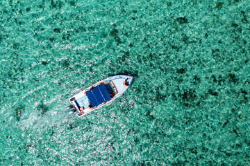 Aerial view, reefs of Flic en Flac beach with excursion boat, Mauritius, Africa