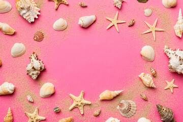 Summer time concept Flat lay composition with beautiful starfish and sea shells on colored table, top view