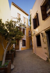 Fototapeta na wymiar Venetian architecture in narrow stone streets of old town Chania in Crete, Greece
