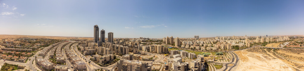 Fototapeta na wymiar Wide aerial panorama of the southern districts of Beer Sheba city