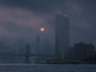 Full moon over financial district 
