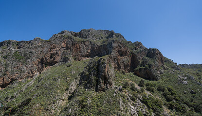 Fototapeta na wymiar High rock cliffs at Topolia Gorge, Crete, Greece.