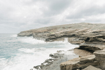 waves crashing on rocks