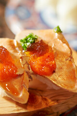 monkfish liver Sushi  on a cutting board