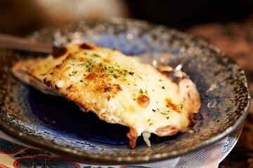 Grilled Butter Cheese Oysters on a Plate