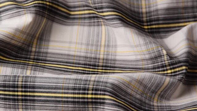 Classic geometric tweed fabric in gray and yellow
