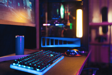 Close-up of empty gaming streaming studio equipped during first person shooter online competition. Professional setup with powerful computer, keyboard, monitor and mouse ready for online championship  © Arsenii