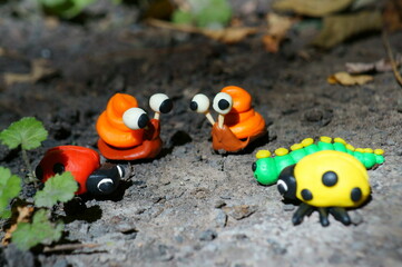 Insect figurines close-up. Toy fairy-tale animals.