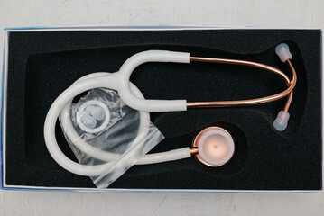 Medical stethoscope. White medical stethoscope.The concept of healthcare.