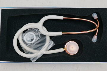 Medical stethoscope. White medical stethoscope.The concept of healthcare.