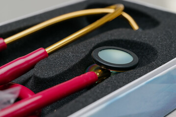 Medical stethoscope. Red medical stethoscope.The concept of healthcare.