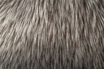 Dog fur. Long haired dog fur. Brown-grey faux fur. Background. Photo
