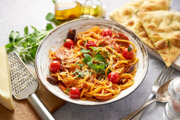 Tasty appetizing pasta served with tomato sauce