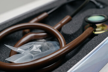 Medical stethoscope. Brown medical stethoscope.The concept of healthcare.