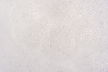 Foam bubble from soap or shampoo for washing isolated on white background from above