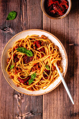 Pasta with bolognese sauce and sun-dried tomatoes