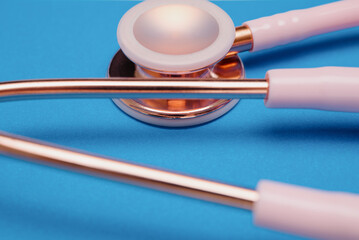 Medical stethoscope.Pink medical stethoscope.The concept of healthcare.