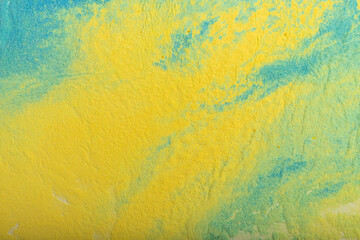 Ukrainian flag colours. The concept of war in Ukraine. Blue and yellow background from holi powder paint.