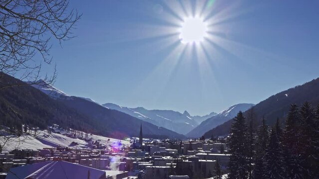 Davos city skyline. Winter sunrise Time lapse. 
