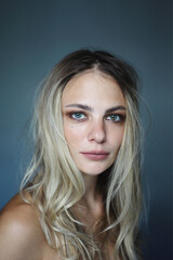 Young beautiful blonde girl with smoky eye makeup