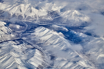 Mountain landscape, view from an airplane, Snowy panorama