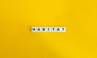 Habitat Word on Letter Tiles on Yellow Background. Minimal Aesthetics.