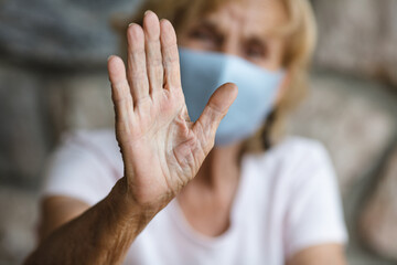 Elderly woman with a face mask