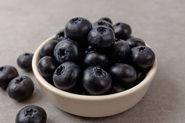Small, round, sour and sweet blueberries