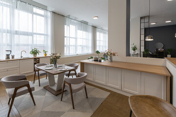 minimalist modern interior design huge bright apartment with an open plan in Scandinavian style in white, blue and dark blue colors with columns in the center. includes kitchen area, office and lounge
