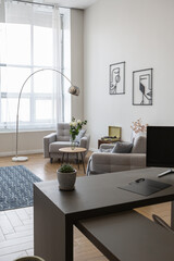 minimalist modern interior design huge bright apartment with an open plan in Scandinavian style in white, blue and dark blue colors with columns in the center. includes kitchen area, office and lounge