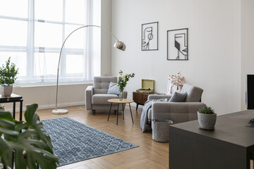 minimalist modern interior design huge bright apartment with an open plan in Scandinavian style in white, blue and dark blue colors with columns in the center. includes kitchen area, office and lounge