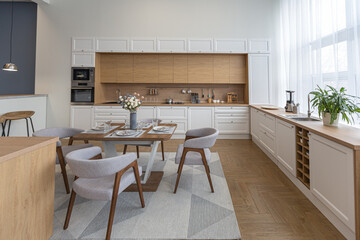 minimalist modern interior design huge bright apartment with an open plan in Scandinavian style in white, blue and dark blue colors with columns in the center. includes kitchen area, office and lounge