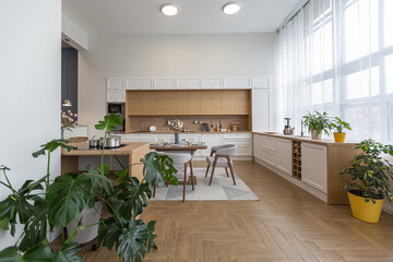 minimalist modern interior design huge bright apartment with an open plan in Scandinavian style in white, blue and dark blue colors with columns in the center. includes kitchen area, office and lounge