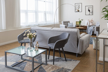 minimalist modern interior design huge bright apartment with an open plan in Scandinavian style in white, blue and dark blue colors with columns in the center. includes kitchen area, office and lounge