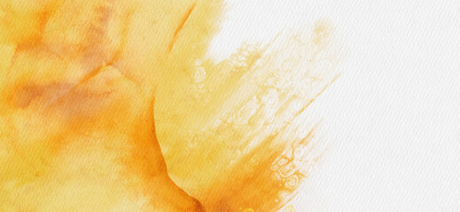 Abstract gold and yellow watercolor paint background.