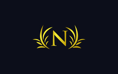 Fototapeta na wymiar Golden laurel wreath leaf logo vector with the letters and alphabets N