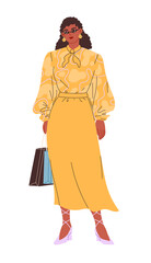 Woman in glasses, yellow blouse, and skirt with bags from shop